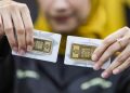 Harga Emas Antam Turun Menjadi Rp1.874.000 Per Gram