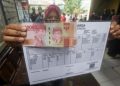 Pemerintah Bagikan Bantuan Rp200 Ribu dan 20 Kg Beras untuk Warga Miskin Bulan Ini