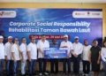 SRO Pasar Modal Indonesia Salurkan Ambulans dan Bibit Terumbu Karang di Papua